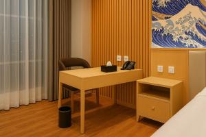 A bed or beds in a room at The Bellezza Hotel Suites