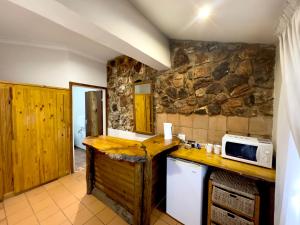 Η κουζίνα ή μικρή κουζίνα στο Centurion Guest House and Lodge