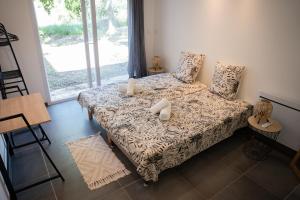 Ένα ή περισσότερα κρεβάτια σε δωμάτιο στο Maison provençale +29 φωτογραφίες