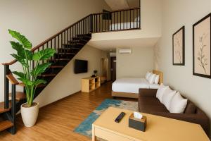 A seating area at The Bellezza Hotel Suites