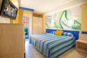 Postel nebo postele na pokoji v ubytování Hotel Servigroup Rialto