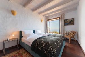 Postel nebo postele na pokoji v ubytování Villa Botánico + 37 fotografií