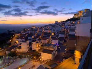 a view of a town at night at Villa Verde in Marconia