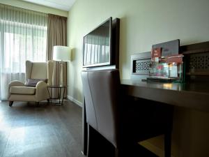 TV a/nebo společenská místnost v ubytování Hotel Thermen Bussloo - Apeldoorn