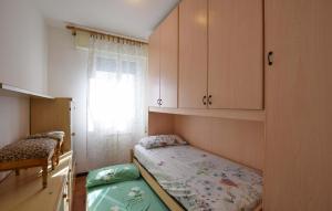 Un pat sau paturi într-o cameră la Casa Angie