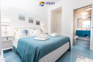 Postel nebo postele na pokoji v ubytování MAR-ISA Amalfi Coast