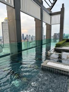 Πισίνα στο ή κοντά στο Condo, 3-min walk to BTS, Sky pool, Gym, Wifi, Self check-in at pickup point