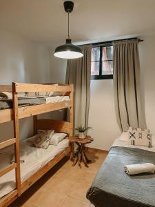 Posteľ alebo postele v izbe v ubytovaní Surf&Sleep