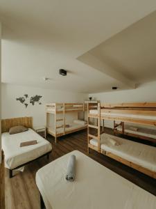 Posteľ alebo postele v izbe v ubytovaní Surf&Sleep