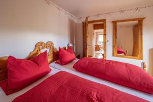 Postel nebo postele na pokoji v ubytování Gästehaus Alpina