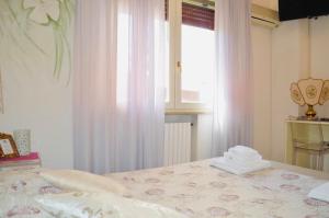 Postel nebo postele na pokoji v ubytování Hotel Julia