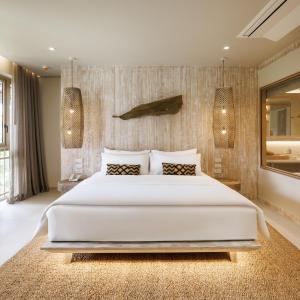 Ein Bett oder Betten in einem Zimmer der Unterkunft Phangan Bayshore Resort Koh Phangan