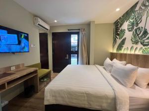 Postel nebo postele na pokoji v ubytování Shinta Guesthouse