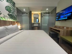 Postel nebo postele na pokoji v ubytování Shinta Guesthouse