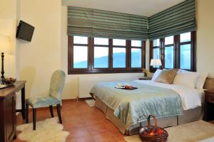 Postel nebo postele na pokoji v ubytování Guesthouse Kapaniaris