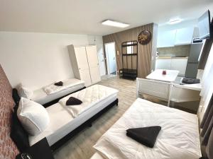 En eller flere senge i et værelse på City Ferienwohnung direkt an der U-Bahn