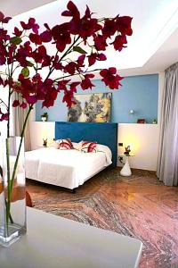Postel nebo postele na pokoji v ubytování B&B Midtown Sorrento Excellence