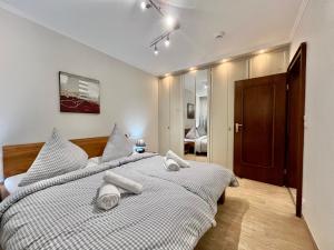 Postel nebo postele na pokoji v ubytování Traumzeit B14 Montana Haus