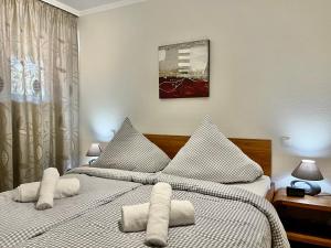 Postel nebo postele na pokoji v ubytování Traumzeit B14 Montana Haus