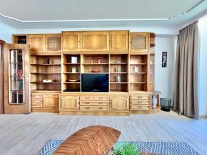 TV a/nebo společenská místnost v ubytování Traumzeit B14 Montana Haus
