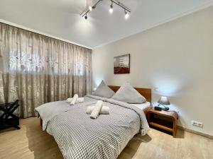 Postel nebo postele na pokoji v ubytování Traumzeit B14 Montana Haus