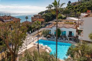 an aerial view of a resort with a swimming pool at Hotel Moresco in Diano Marina