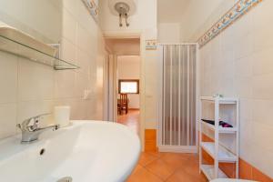 Koupelna v ubytování Residence Favonio + 37 fotografií