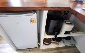 A cozinha ou kitchenette de How Hide Homestay