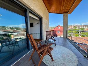 Μπαλκόνι ή βεράντα στο Cabral House Jardín, BBQ y Bañera Hidromasaje