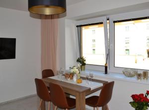 Televízia a/alebo spoločenská miestnosť v ubytovaní Apartmany u Polanských Lednice
