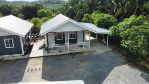an aerial view of a small house with trees at al Hajari Inn - For Islam Only - Kg Banggol Batu Lenggong in Kampong Banggol Belimbing