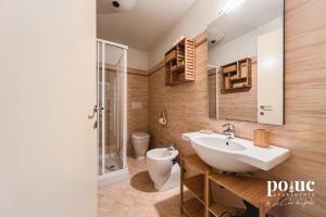 Koupelna v ubytování Maison del Bosco - Poluc Apartments bilocale