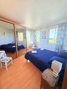 En eller flere senger på et rom på Atlantide - Somptueuse Villa Classée 4 étoiles - Saint-Clair - Vue Exceptionnelle - Piscine