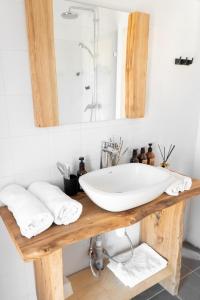a bathroom with a sink and a mirror at Charyn Canyon Camp in Kökpek