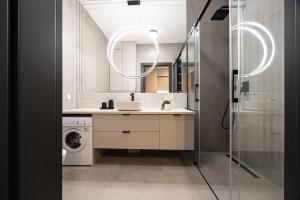 Koupelna v ubytování 2HomeRent Apartamenty Nowy Port + 281 fotografií