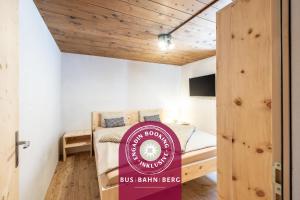 Tempat tidur dalam kamar di Ustarea Spluga