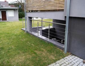a building with a dog in the side of it at Villa Arkodes in Gdańsk