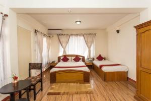 Letto o letti in una camera di Thamel Eco Resort