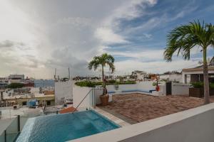 a view from the roof of a house with a swimming pool at La Terraza de San Juan in San Juan