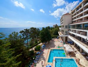 an aerial view of a hotel with a swimming pool at Hotel Excelsior - Liburnia in Lovran