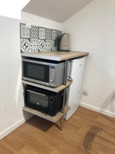 Kuchyň nebo kuchyňský kout v ubytování Studio mezzanine des Eaux Vives + 7 fotografií