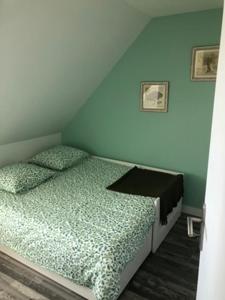 Postel nebo postele na pokoji v ubytování Maison de pêcheur sur l'île de Groix