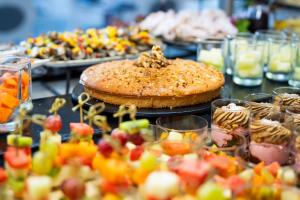 a table topped with a cake and other desserts at Labranda Marieta & Spa - Adults Only in Playa del Ingles
