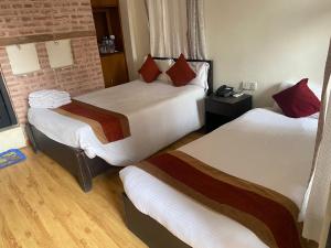 Letto o letti in una camera di Thamel Eco Resort