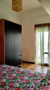 Postel nebo postele na pokoji v ubytování Appartamento laurentum