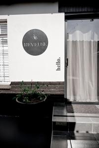 a door with a sign that reads kyrusrtrust at Reveuse in Pretoria