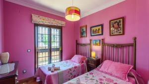 Posteľ alebo postele v izbe v ubytovaní Casa Huerta San Miguel El Bosque by Ruralidays + 17 fotografií