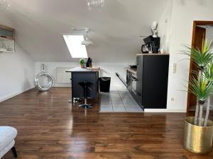Kuchyň nebo kuchyňský kout v ubytování Moderne & stilvolle Wohnung klimatisiert - Messe & Flughafen München