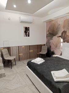 Postel nebo postele na pokoji v ubytování La Corte Guest House + 37 fotografií