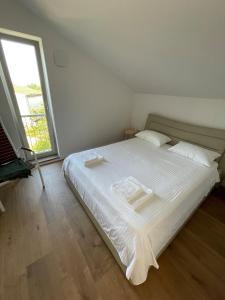 Ένα ή περισσότερα κρεβάτια σε δωμάτιο στο Island home Green Escape Cres